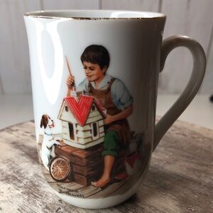 Norman Rockwell Museum porcelain mug featuring the painting A Dollhouse for Sis
